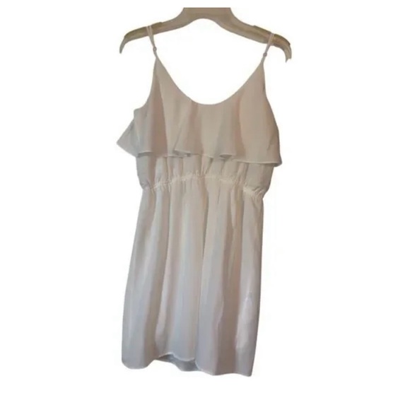 BCBGeneration Dresses & Skirts - BCBGeneration White Ruffle Mini Dress with Spaghetti Straps